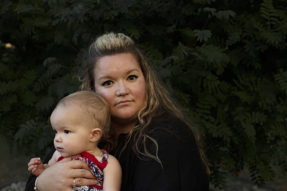 Columbine survivor Missy Mendo and her 15-month old daughter Ellie Cordes at her home in Lakewood, Colorado on August, 16, 2019. (Rachel Woolf/AFP via Getty Images)