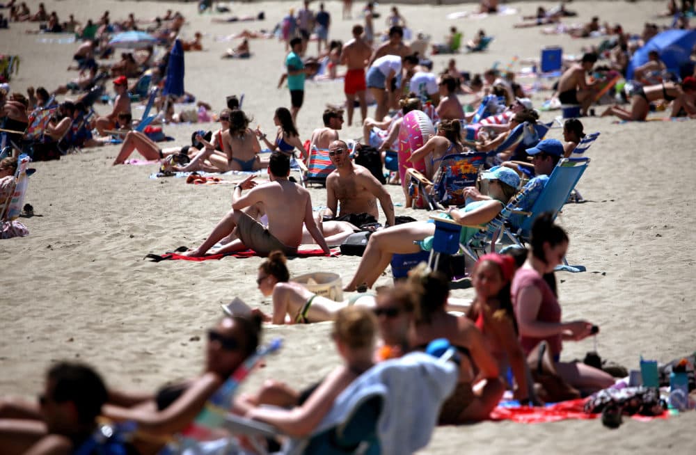 Crowds at the beach in South Boston in 2020. (Barry Chin/The Boston Globe via Getty Images)