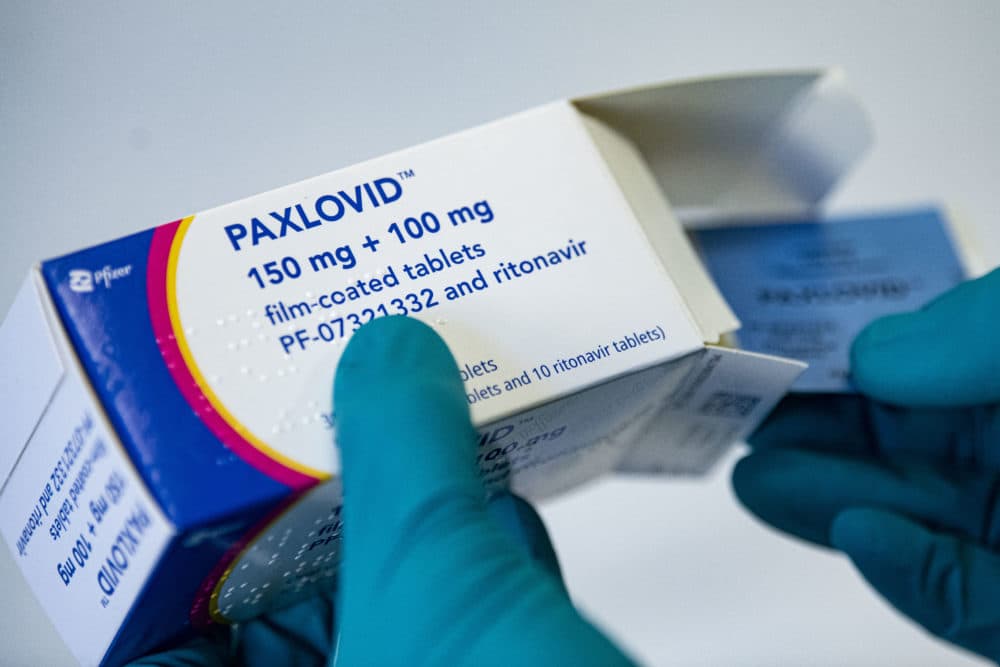 A person holds the drug Paxlovid from the U.S. pharmaceutical company Pfizer against COVID-19. (Fabian Sommer/picture alliance via Getty Images)