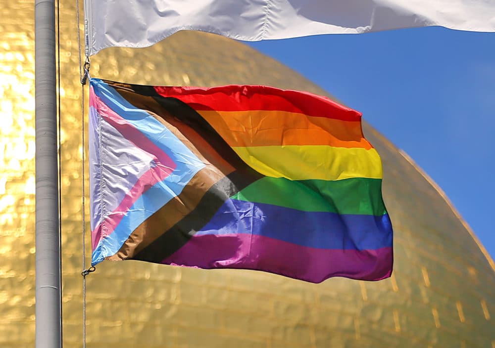 A new transgender flag is hoisted at the State House in Boston. (John Tlumacki/The Boston Globe via Getty Images)