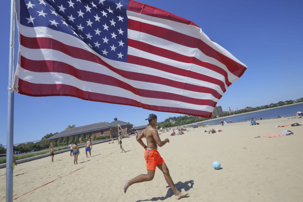 In this 2017 file photo, an American flag flies at Carson Beach in Boston. (Nicolaus Czarnecki/MediaNews Group/Boston Herald via Getty Images)