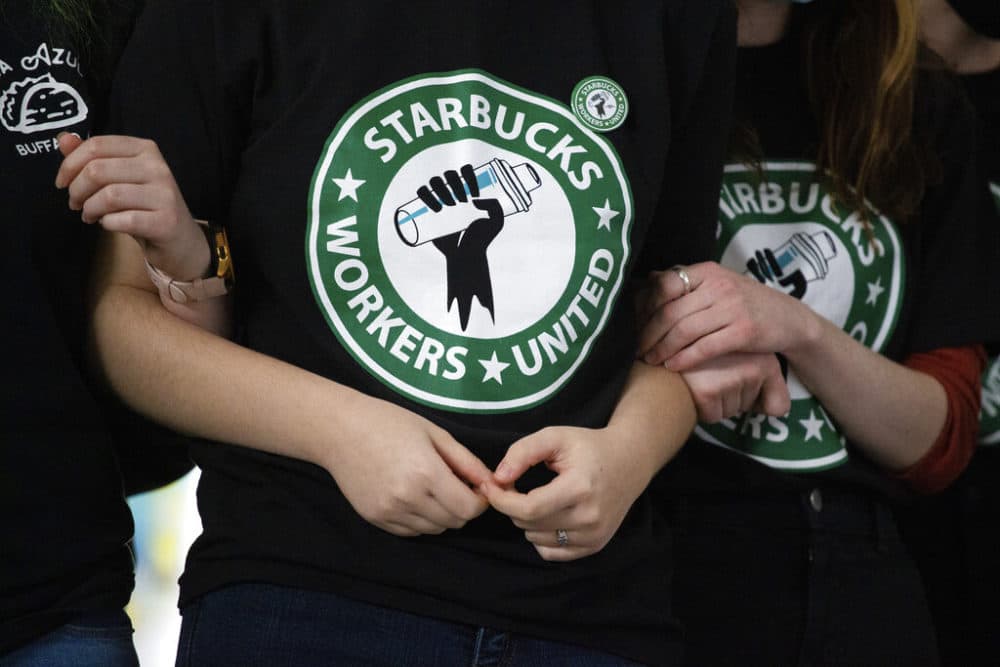 Starbucks employees and supporters react as votes are read during a union-election watch party on Dec. 9, 2021, in Buffalo, N.Y. (Joshua Bessex/AP File)