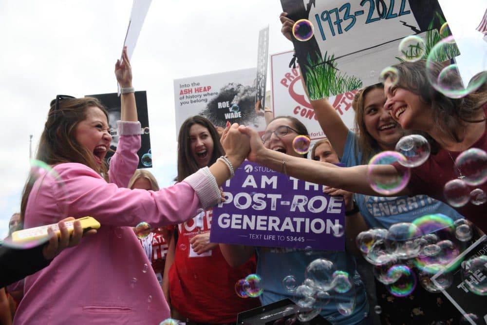 Anti-abortion campaigners celebrate outside the US Supreme Court in Washington, DC, on June 24, 2022. (Olivier Douliery/AFP via Getty Images)