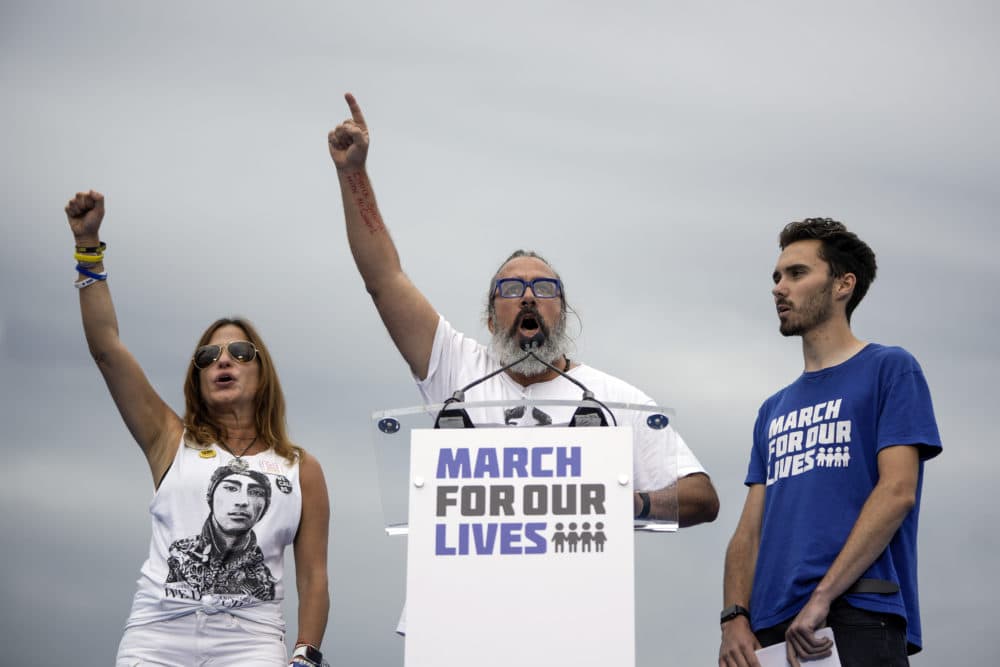 Manuel (C) and Patricia (L) Oliver, parents of Parkland shooting victim Joaquin Oliver, and gun control activist David Hogg speak during a March for Our Lives rally against gun violence on the National Mall June 11, 2022 in Washington, DC. The March For Our Lives movement was spurred by the shooting at Marjory Stoneman Douglas High School in Parkland, Florida, in 2018. (Drew Angerer/Getty Images)