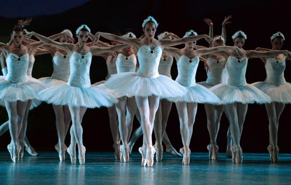 Dancers perform &quot;Swan Lake&quot; by Piotr Tchaikovsky. (Attila Kisbenedek/AFP via Getty Images)