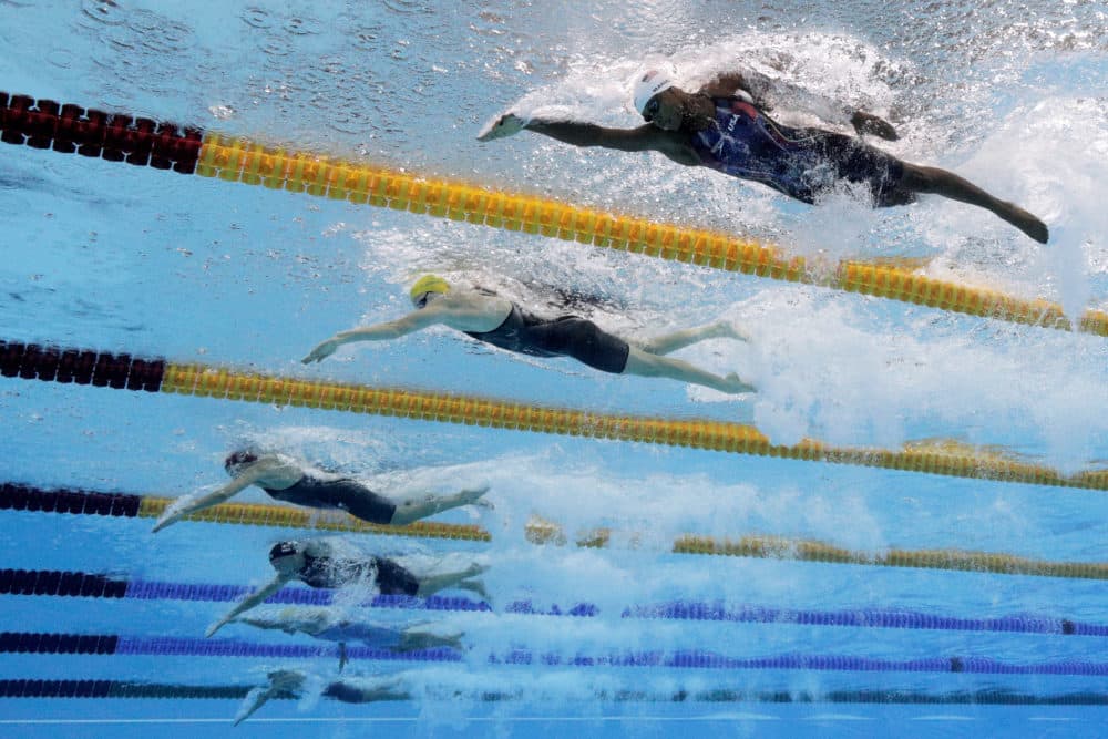 From right to left, Simone Manuel of the United States, Cate Campbell of Australia and Francesca Halsall of Great Britain compete in the Women's 50m Freestyle heat on Day 7 of the Rio 2016 Olympic Games at the Olympic Aquatics Stadium on Aug. 12, 2016 in Rio de Janeiro, Brazil. (Adam Pretty/Getty Images)