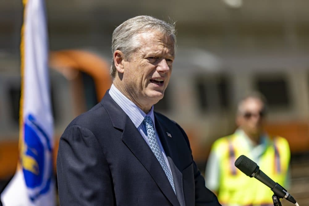 Governor Charlie Baker announces a 30-day MBTA Orange Line shutdown beginning on August 19, 2022, in order to make sweeping maintenance improvements, at a press conference at the Wellington train yard in Medford. (Jesse Costa/WBUR)