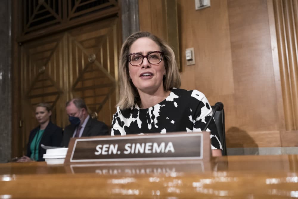 Sen. Kyrsten Sinema, D-Ariz., a centrist who was seen as the pivotal vote, said in a statement that she had agreed to changes in the measure's tax and energy provisions and was ready to “move forward” on the bill. (J. Scott Applewhite/AP)