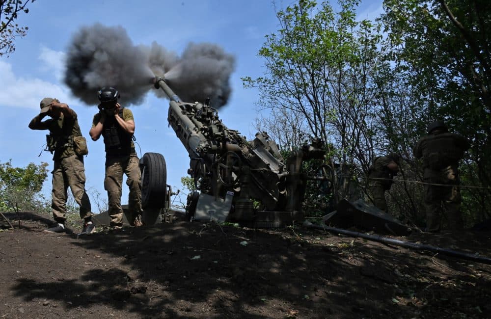 Ukrainian gunmen fire a US made M777 howitzer from their position on the front line in Kharkiv region on Aug. 1, 2022, amid Russia's military invasion launched on Ukraine. (Sergey Bobok/AFP via Getty Images)