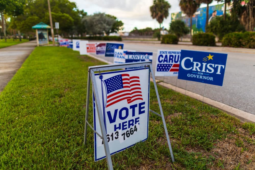A Vote Here sign outside of a polling station on August 23, 2022 in West Palm Beach, Florida. (Saul Martinez/Getty Images)