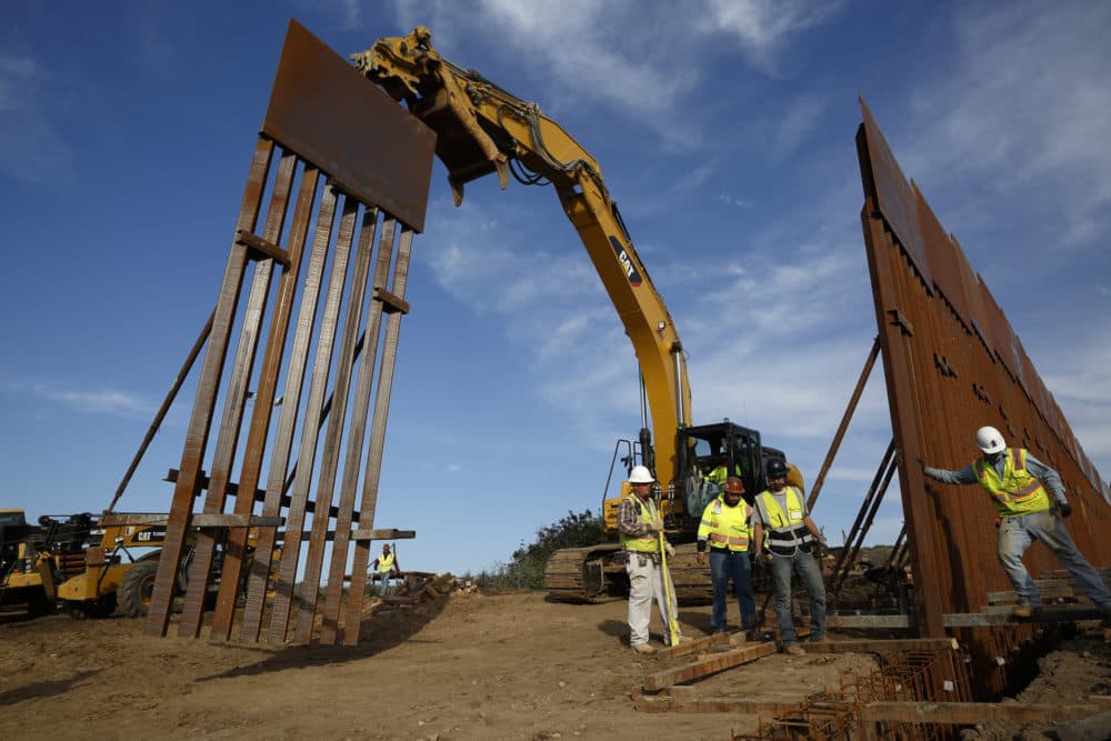 Construction crews install new border wall sections seen from Tijuana, Mexico., Jan. 9, 2019. (Gregory Bull/AP)