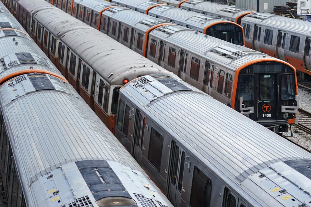 Old and new subway cars are parked at the Orange Line's Wellington Station train yard on July 13, 2022, in Medford, Mass. (Charles Krupa/AP File)