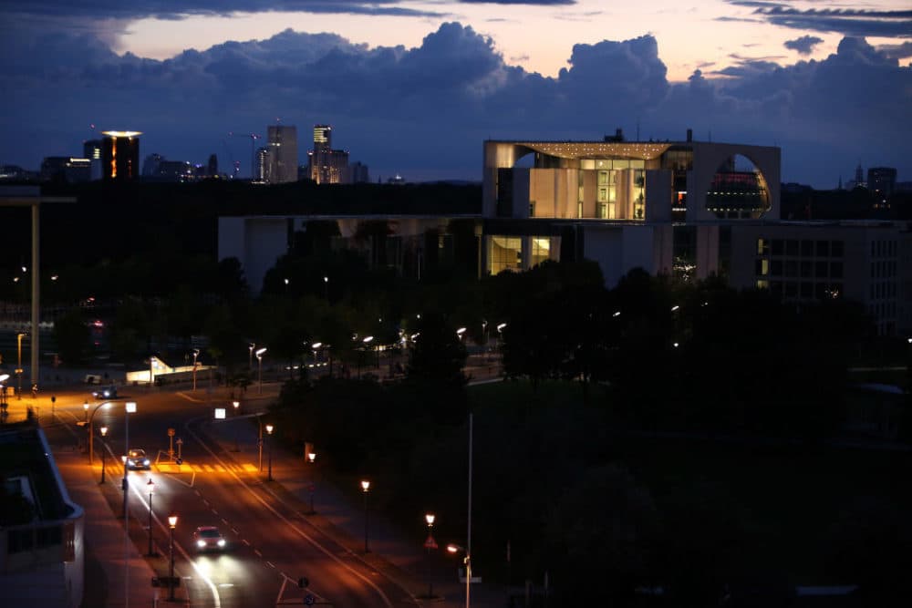 Traffic passes the mostly-dimmed German federal Chancellery in the evening on September 10, 2022 in Berlin, Germany. (Adam Berry/Getty Images)