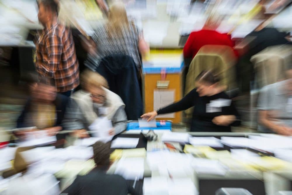 Election helpers are seen as they count the last votes in the municipality of Stockholm at the Stockholm City Hall on September 14, 2022. Never before has a Swedish government relied on the support of the anti-immigration and nationalist Sweden Democrats, the big winners of the vote. (Photo by Jonathan Nackstrand/AFP via Getty Images)