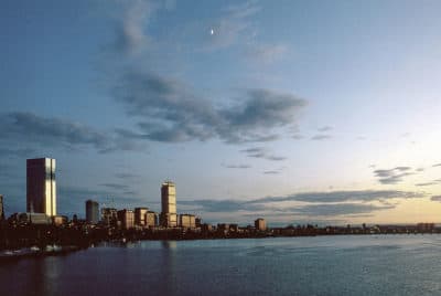 Prudential and John Hancock Buildings reflect sunset over Charles River, Boston, Massachusetts in 1976, the year after Anita Diamant started calling the city home. (Spencer Grant/Getty Images)