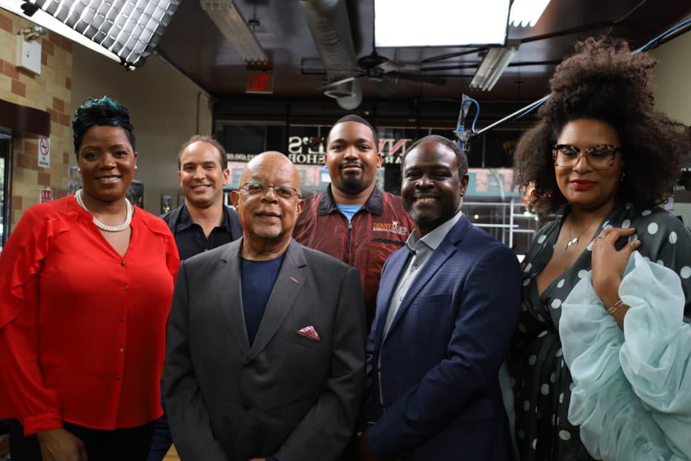 Host, Henry Louis Gates Jr., pose for photo in the barbershop with Naneka Brathwaite, Bernard Lumpkin, Julee Wilson, Dennis Mitchell Jr. and Joseph Ravenell while shooting &quot;Making Black America: Through the Grapevine.&quot; (PBS)