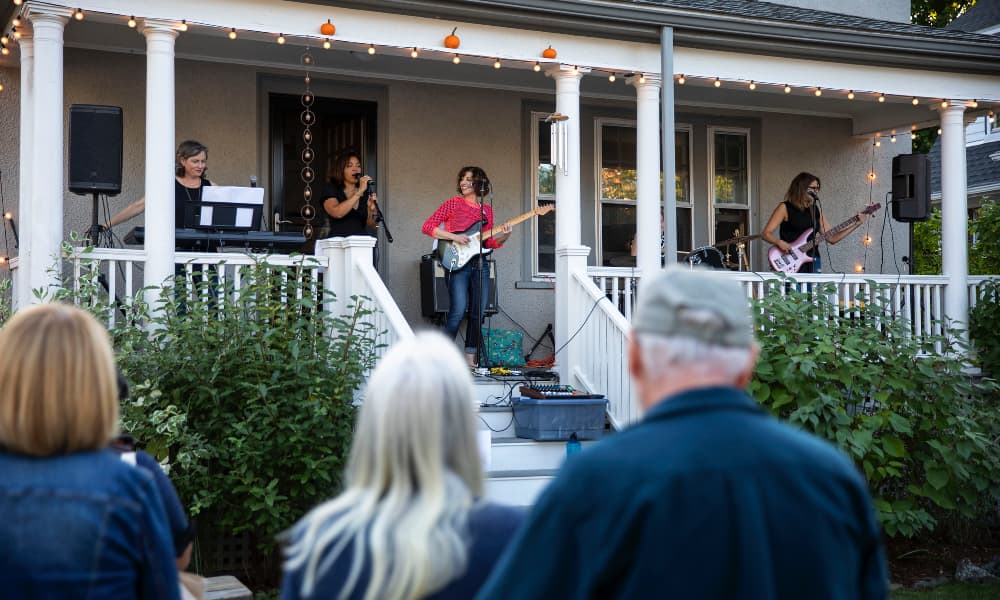 The Lazy Susans from left to right: Imge Ceranoglu, Leila Mitchell, Joanna Weiss, Martha Kennedy, and Heather Shaw, at Milton Porchfest, 2022. (Robin Lubbock/WBUR)
