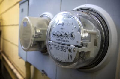 An electricity meter on a house in Cambridge. (Robin Lubbock/WBUR)