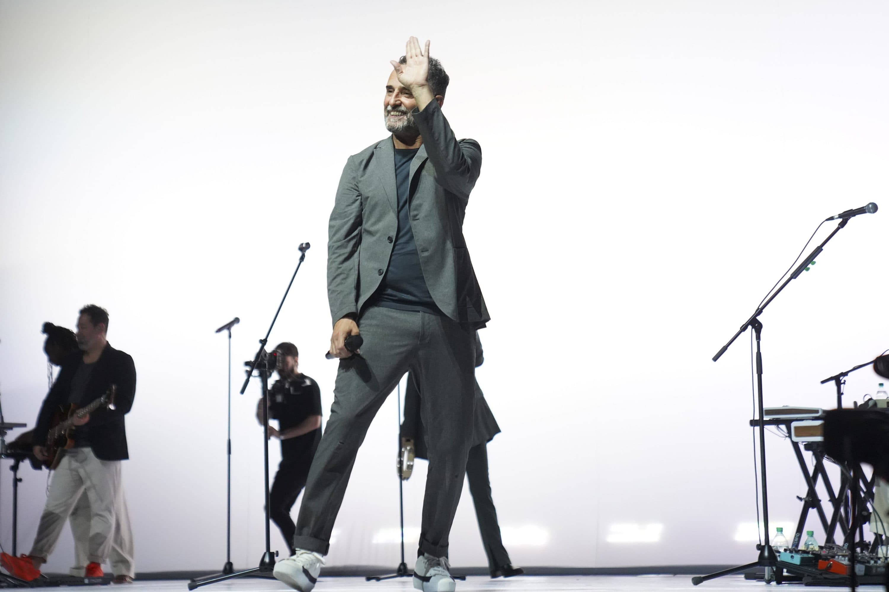 Uruguayan singer Jorge Drexler waves to fans as he performs music from his new album &quot;Tinta y tiempo&quot; in his hometown of Montevideo, Uruguay in September. (Matilde Campodonico/AP)