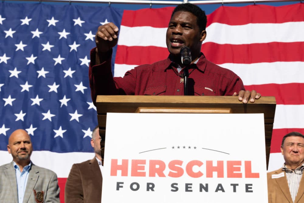 Georgia Republican Senate nominee Herschel Walker addresses the crowd of supporters during a campaign stop on October 20, 2022 in Macon, Georgia.  (Jessica McGowan/Getty Images)
