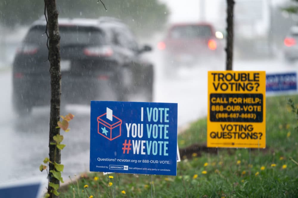 A sign encouraging voting sits along along a roadway on November 6, 2022 in Charlotte, North Carolina. (Sean Rayford/Getty Images)