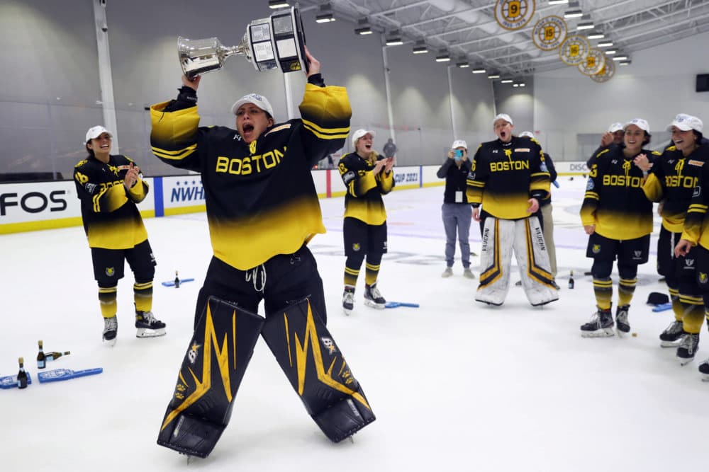 Victoria Hanson #33 of Boston Pride celebrates after the Pride defeat the Minnesota Whitecaps 4-3 in the NWHL Isobel Cup Championship at Warrior Ice Arena on March 27, 2021 in Boston. (Maddie Meyer/Getty Images)