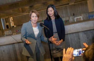 Gov.-elect Maura Healey and Boston Mayor Michelle Wu talk to reporters after meeting in Wu's office Tuesday afternoon. (Sam Doran/SHNS)
