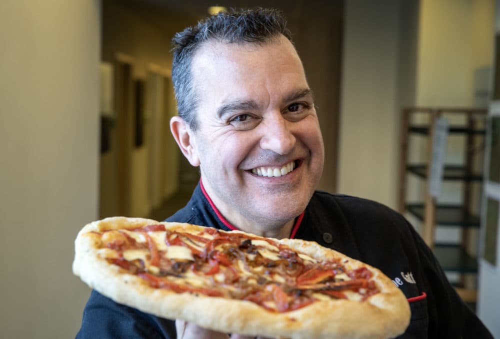 Chef Joe Gatto brings pizza to Radio Boston. (Robin Lubbock/WBUR)