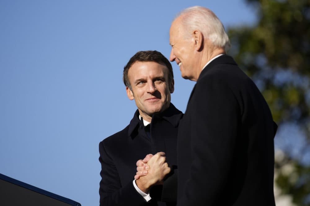 President Joe Biden and French President Emmanuel Macron stand on the stage during a State Arrival Ceremony. (Andrew Harnik/AP)