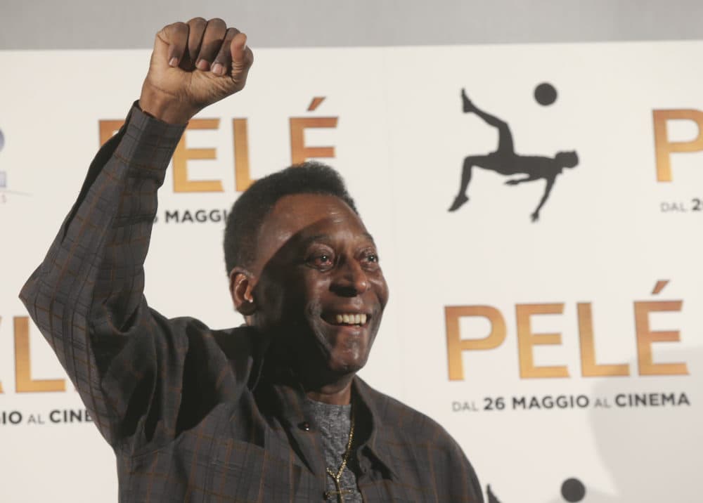 Brazilian soccer legend Edson Arantes Do Nascimiento better known as 'Pele', gestures during a photocall. (Luca Bruno/AP)