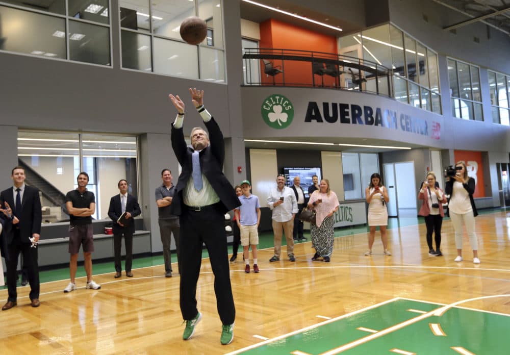 Gov. Charlie Baker shoots at the Boston Celtics basketball team practice facility on June 19, 2018. (Elise Amendola/AP)