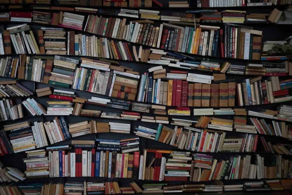 A bookshelf in a street. (Joel Saget/AFP via Getty Images)