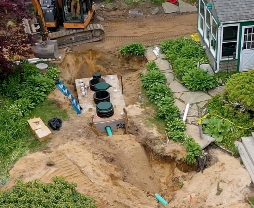 Installing a nitrogen-filtering septic system. (Courtesy Barnstable Clean Water Coalition)