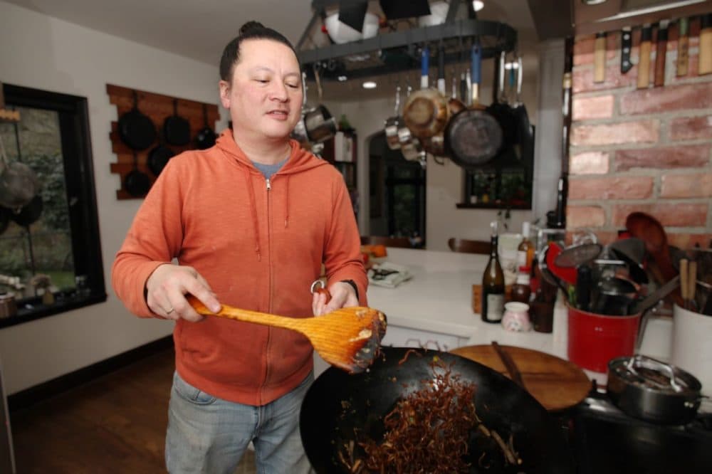 Chef and food writer J. Kenji López-Alt using his wok. (Courtesy J. Kenji López-Alt)