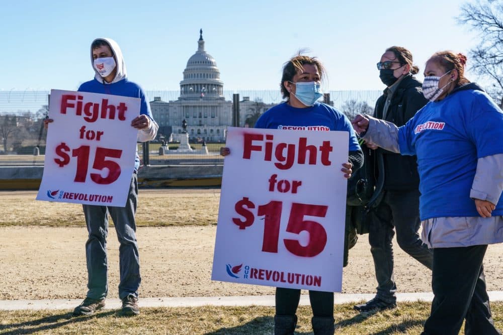 Activists appeal for a $15 federal minimum wage near the Capitol in Washington D.C. in 2021. (J. Scott Applewhite/AP)
