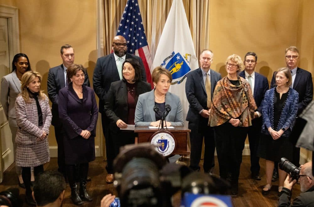 Gov. Maura Healey talks to reporters after her first Cabinet meeting Friday, joined by (from left): Acting Housing and Economic Development Secretary Jennifer Maddox, Transportation Secretary Gina Fiandaca, Administration and Finance Secretary Matthew Gorzkowicz, Energy and Environmental Affairs Secretary Rebecca Tepper, Education Secretary Patrick Tutwiler, Lt. Gov. Kim Driscoll, Technology Services and Security Secretary Jason Snyder, Climate Chief Melissa Hoffer, Public Safety and Security Secretary Terrence Reidy, Acting Health and Human Services Secretary Mary Beckman, and Acting Labor and Workforce Development Secretary Mike Doheny. (Sam Doran/SHNS)