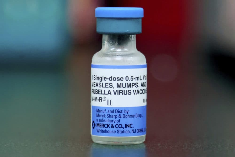 A vial of a measles, mumps and rubella vaccine. (Paul Vernon/AP)