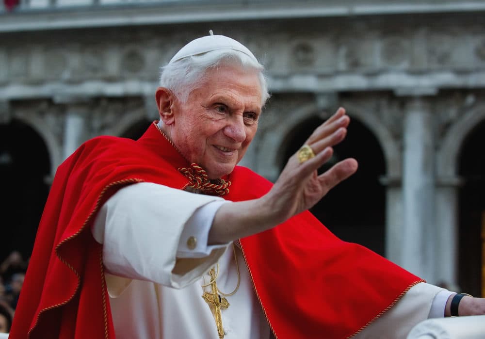 Pope Benedict XVI greets the crowd gathered in St Mark's Square while crossing the square on an electric car on May 7, 2011 in Venice, Italy. (Marco Secchi/Getty Images)