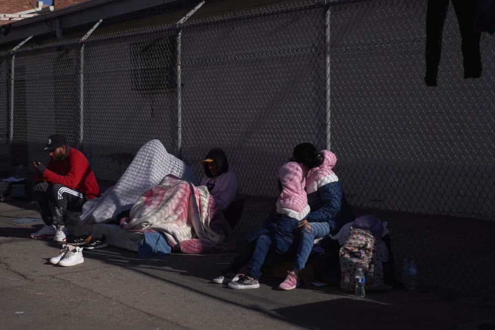 Migrants forced to spend days and nights on the street due to overcrowded shelters are seen in El Paso, Texas. (Allison Dinner/AFP via Getty Images)