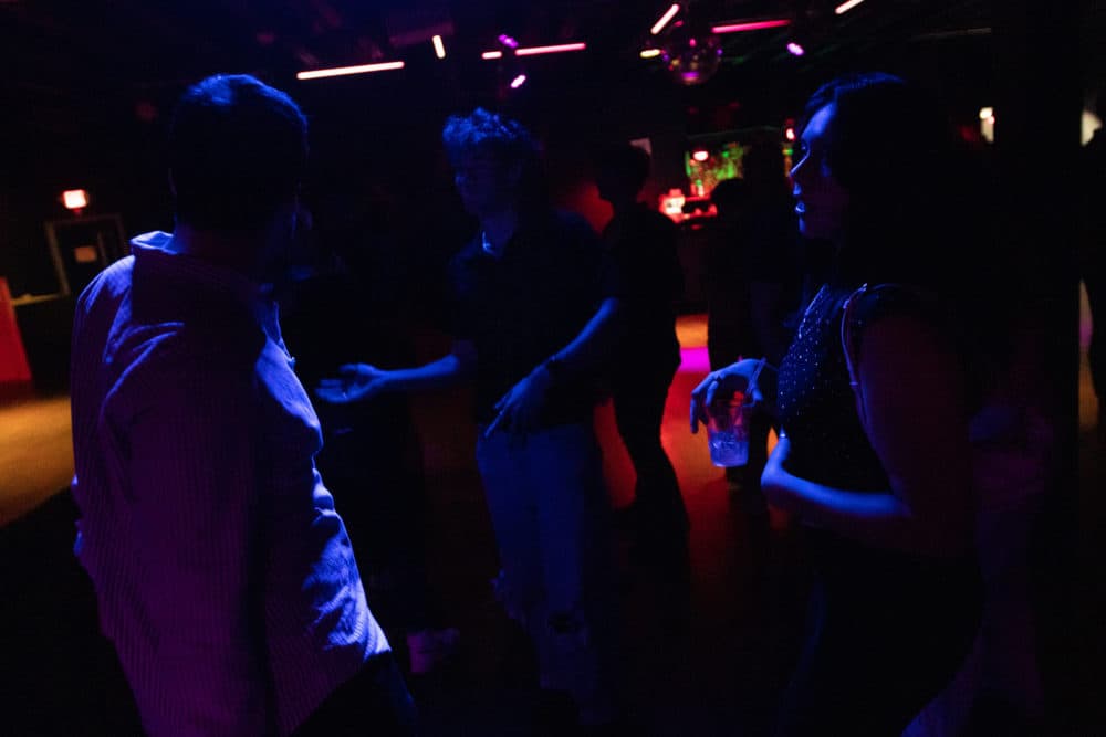 People dancing on Campus Night at the newly reopened ManRay in Cambridge. (Jesse Costa/WBUR)