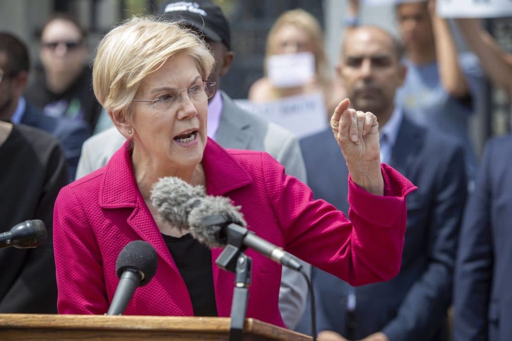 Sen. Elizabeth Warren speaks to a crowd gathered at the Massachusetts State House to protest the US Supreme Court's decision to overturn Roe v. Wade. (Robin Lubbock, WBUR)