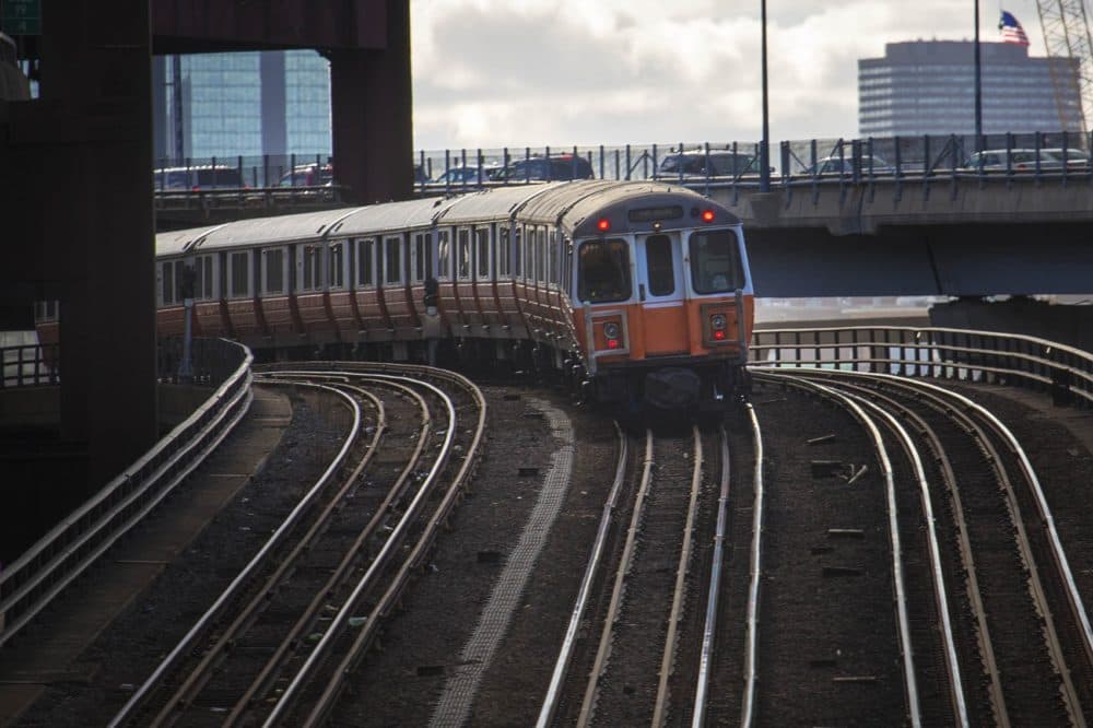 An MBTA Orange Line train travelling towards Sullivan Station. (Jesse Costa/WBUR)
