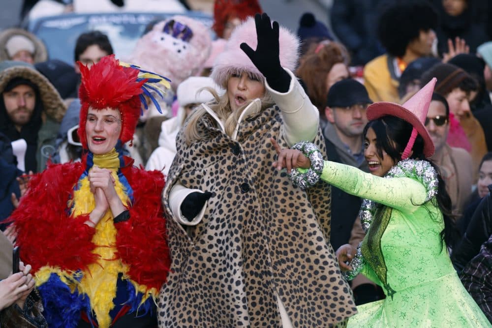 Harvard's Hasty Pudding Theatricals Woman of the Year Jennifer Coolidge, center, rides in a parade in her honor, Saturday, Feb. 4, 2023, in Cambridge, Mass. (Michael Dwyer/AP)