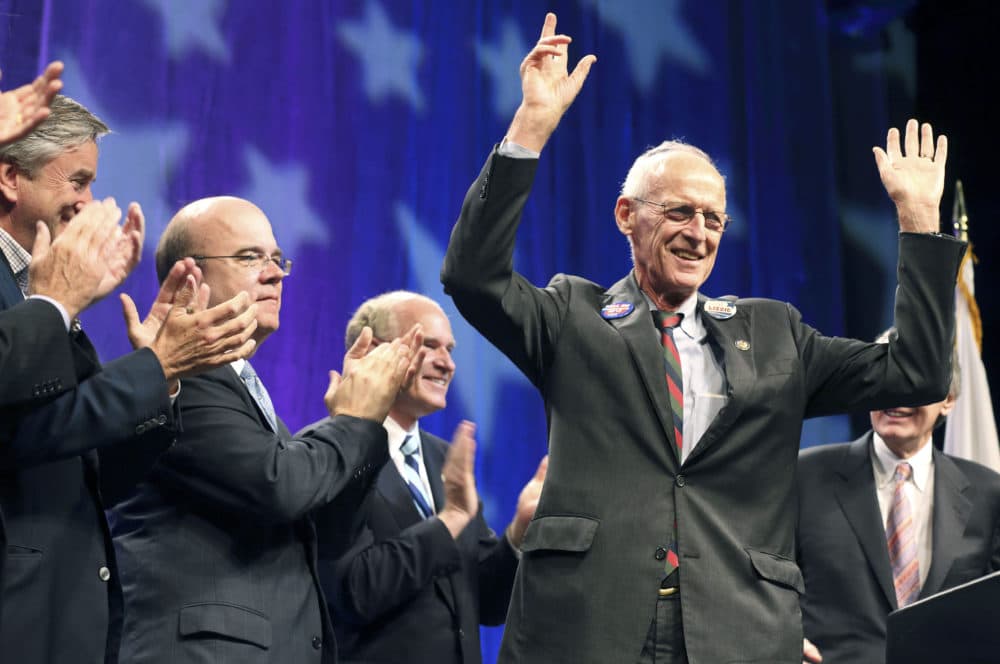 Retiring U.S. Congressman, John Olver, D-Mass., right, gestures to the audience as other members of the state's congressional delegation look on during a tribute to Olver at the Democratic State Convention in Springfield, Mass. on Saturday, June 2, 2012. (Michael Dwyer/AP)