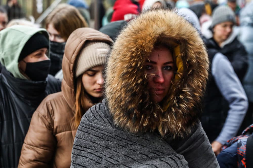 Refugees from Ukraine are standing in a line at the aid point which was opened at Henryk Reymans Municipal Stadium. Krakow, Poland on March 9th, 2022.    (Beata Zawrzel/NurPhoto via Getty Images)