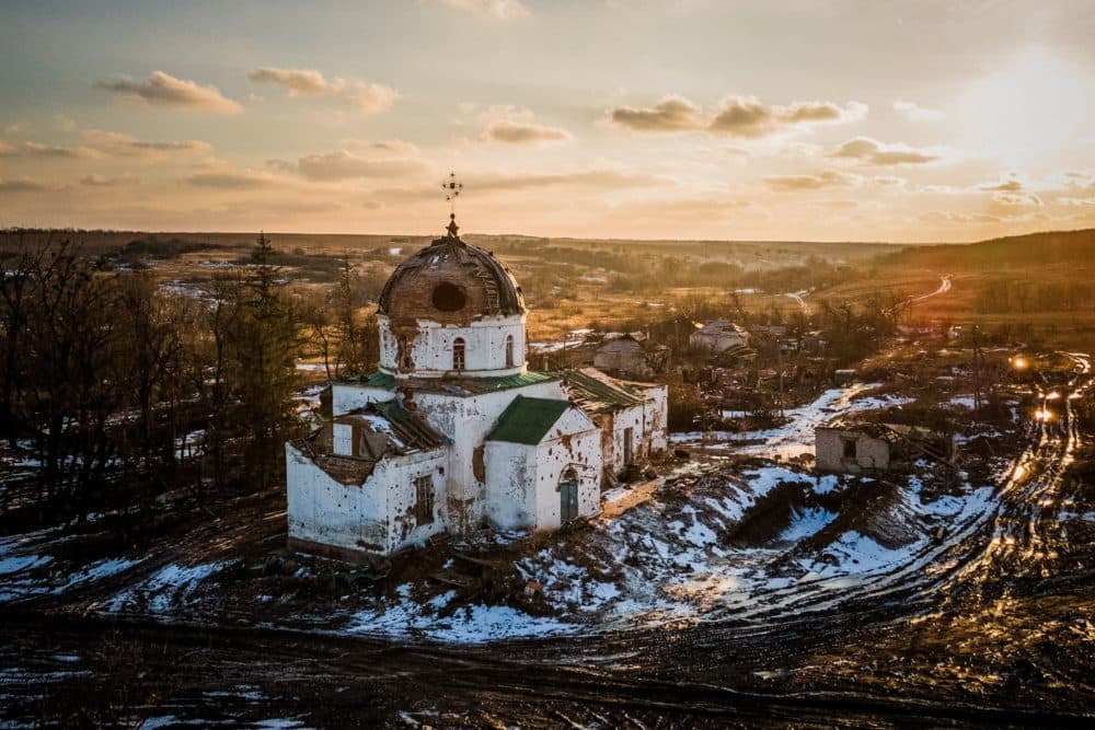 TOPSHOT - This aerial photograph shows a damaged church, which was used by Russian troops as a makeshift hospital, in the village of Mala Komyshuvakha, Kharkiv region, on Febr. 22, 2023, amid Russia's military invasion on Ukraine. (Ihor Tkachov/AFP via Getty Images)