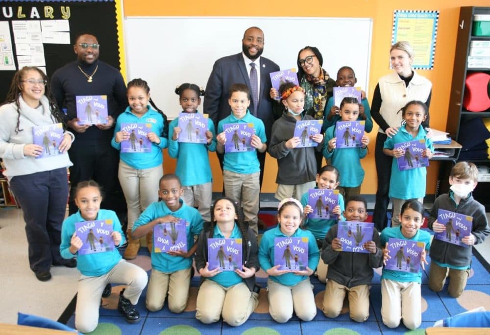 Students at the Conservatory Lab Charter received copies of ‘Tiagu Y Vovo’ from Author Djofa Tavares and State Rep. Chris Worrell on a Feb. 2 visit. (Seth Daniel/Dorchester Reporter)