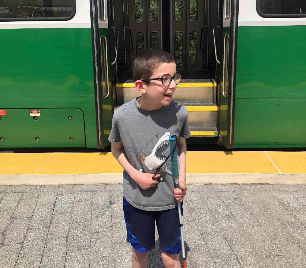 The author’s son, Henry, loves riding the T -- and has CVI, a brain-based visual impairment. “You can find us on a train every weekend. Henry is the one announcing all the stops at the top of his lungs and asking everyone which stop is theirs.” 2023 (Courtesy Rachel Bennett)