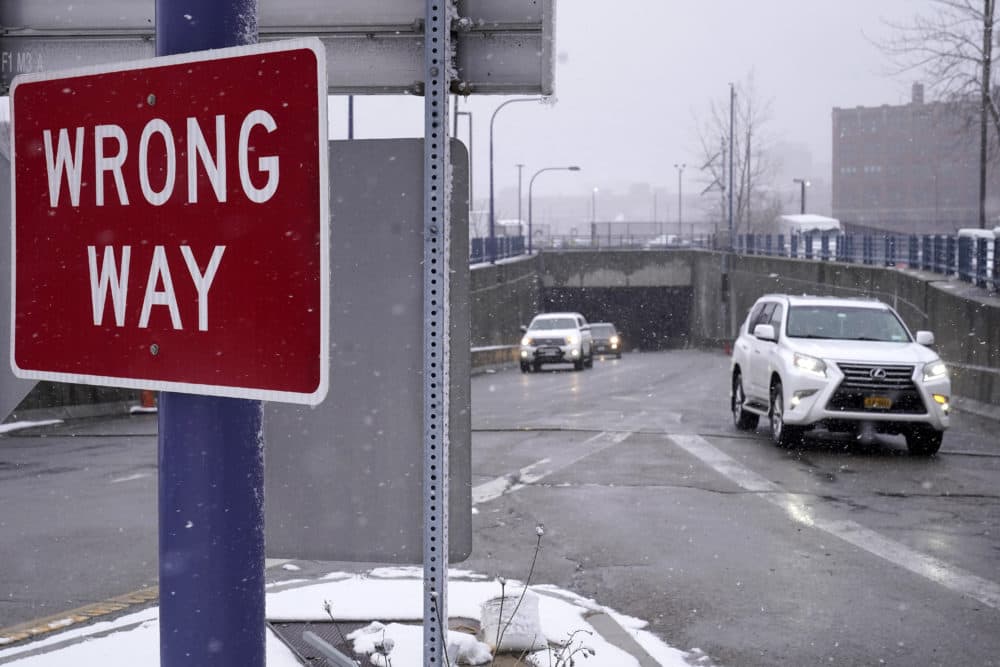 A &quot;Wrong &quot;Way&quot; sign warns drivers from entering westbound on an eastbound exit ramp from the Massachusetts Turnpike, Route I-90, in Boston, Feb. 23. (Steven Senne/AP)