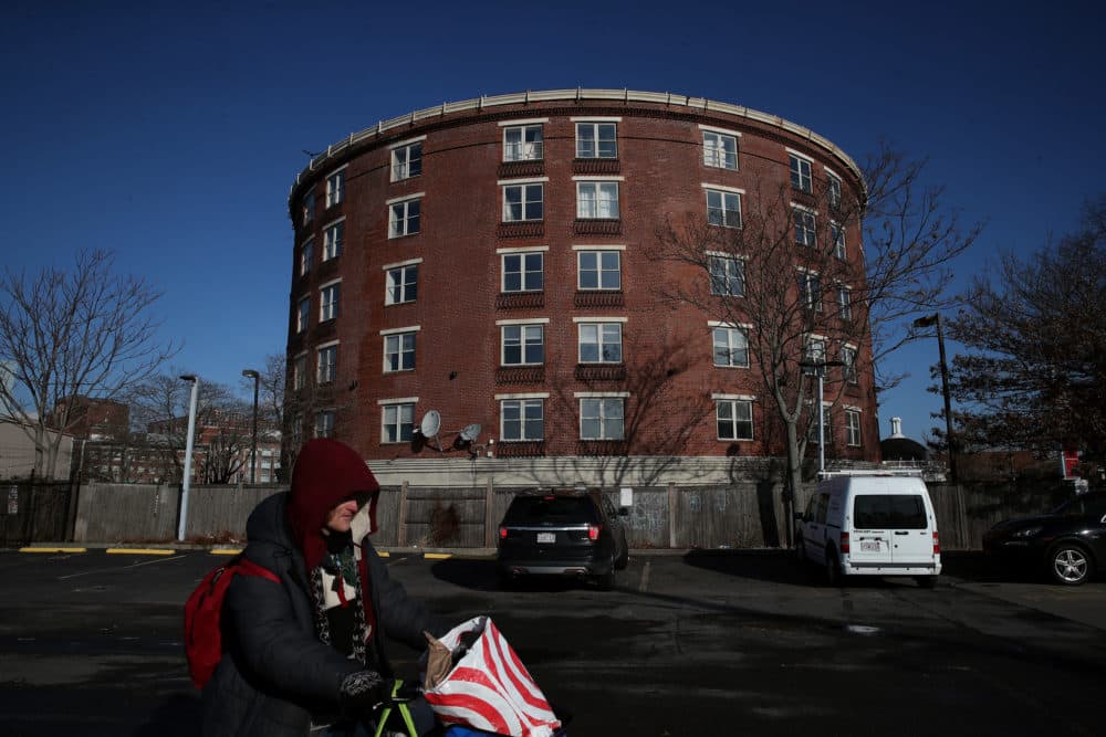 The former Roundhouse Suites hotel in Boston near the intersection of Massachusetts Avenue and Melnea Cass Boulevard, also known as &quot;Mass. and Cass,&quot; has been used for transitional housing and an addiction program since January 2022. (Craig F. Walker/The Boston Globe via Getty Images)